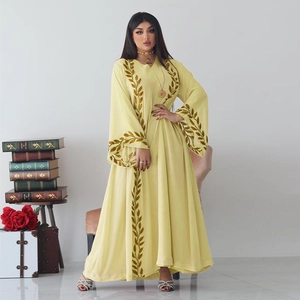 Elegant light yellow chiffon abaya with golden leaf embroidery and matching hijab