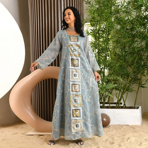 Detail of light blue abaya featuring gold linear embroidery and colorful sequin trim