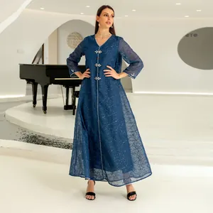 Close-up of navy mesh abaya featuring intricate geometric embroidery and floral beadwork