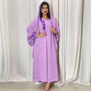 Detailed view of the dark purple embroidery on a light purple chiffon Abaya sleeve