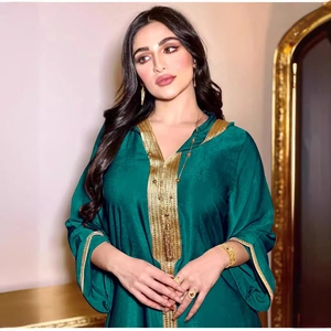 Deep green satin kaftan maxi dress with elaborate gold embroidery and long sleeves