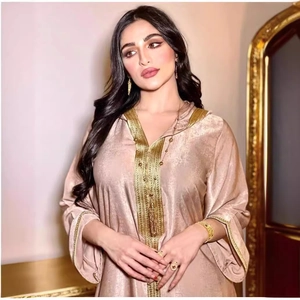 Elegant champagne hooded kaftan dress with intricate gold embroidery and silk-like finish