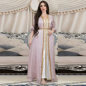 Detail of lavender satin kaftan with golden lace trim and white inner dress set