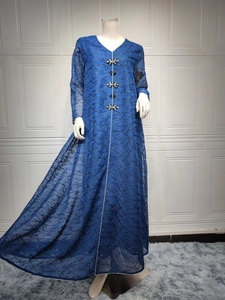 Detail of V-neck abaya with sparkling silver floral rhinestone buttons and mesh embroidery