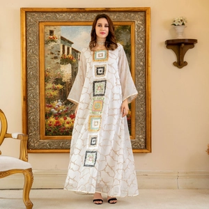 Elegant white kaftan dress with gold sequin embroidery and long sleeves for women