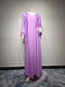 Detailed view of lavender chiffon maxi dress featuring intricate purple leaf embroidery