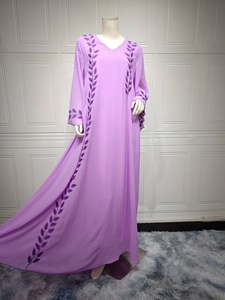 Detailed view of dark purple leaf embroidery on light purple chiffon maxi dress
