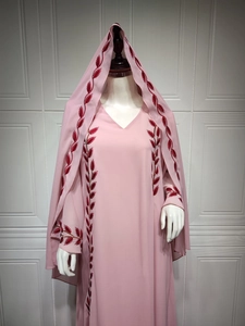 Detailed red leaf embroidery on a light pink chiffon summer dress with matching hijab