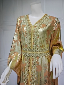 Detail of V-neck gold embroidery and metallic print on brown chiffon kaftan dress