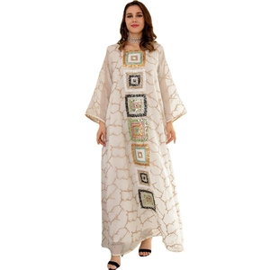 Elegant white kaftan dress with brown branch prints and colorful sequined square patches