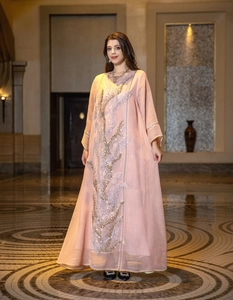 Elegant light pink maxi dress featuring intricate silver sequin embroidery for summer wear