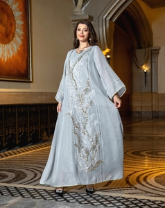 Elegant light blue long kaftan dress with intricate silver and gold sequin embroidery detailing