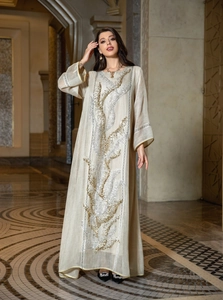 Elegant oversized summer kaftan dress with gold and silver sequin embroidery details.