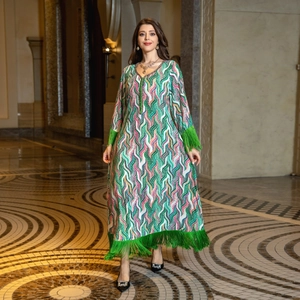 Bohemian kaftan dress with colorful wave print, V-neck sequin trim and green tassels