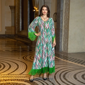 Bohemian women's V-neck maxi dress with colorful abstract print and green fringe hem