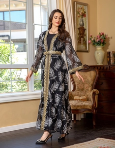 Detail of golden wave embroidery and leaf print on ethnic black mesh long robe