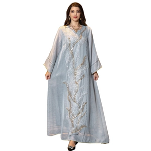 Elegant light blue long dress with shimmering sequin embroidery and wide sleeves
