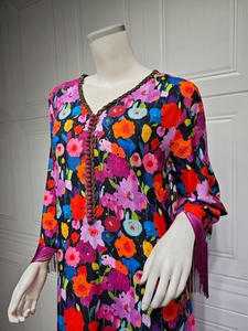 Ethnic maxi dress with colorful floral print, V-neck woven trim and purple tassel sleeves