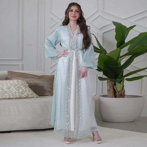 Elegant light blue puff sleeve kaftan with silver sequin embroidery and a waist belt