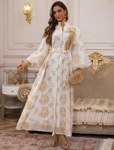 Detailed gold leaf embroidery on white Jalabiya dress with front zipper and stand collar