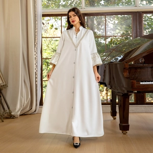 Elegant white jacquard maxi abaya dress with V-neck silver embroidery and flared sleeves