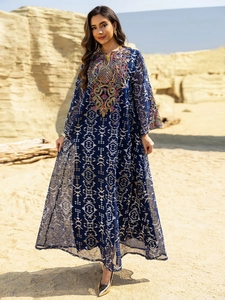 Exquisite embroidery on the neck and ethnic geometric prints on this navy kaftan dress