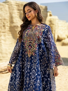 Close-up of intricate colorful embroidery on dark blue V-neck ethnic maxi dress