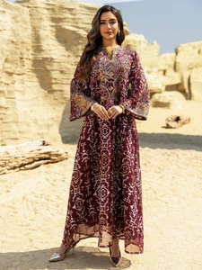 Intricate embroidery details on the neckline and front of this wine red ethnic maxi dress