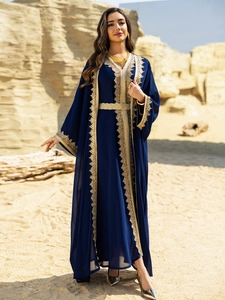 Detailed view of dark blue chiffon dress with gold geometric embroidery and matching belt