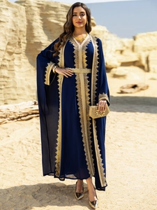 Detail view of navy blue chiffon kaftan with golden lace embroidery and braided belt