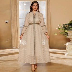 Elegant champagne gold long dress with leaf embroidery, high neck, and flared sleeves