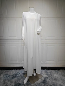 Detail of elegant white sleeveless V-neck maxi dress with lightweight chiffon texture