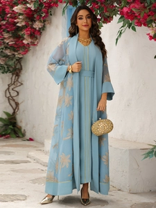 Detail of light blue Abaya set with gold palm tree embroidery and elegant waist tie