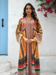 Detailed close-up of ethnic print chiffon maxi dress with intricate geometric patterns