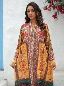 Close-up of bohemian ethnic print and rhinestone detailing on the summer chiffon maxi dress