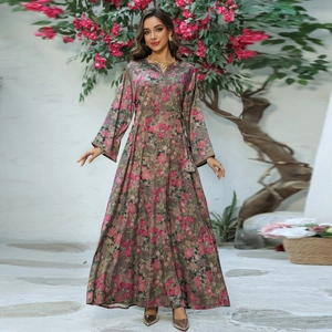 Elegant long-sleeved floral print kaftan dress with gold embroidery and soft fabric