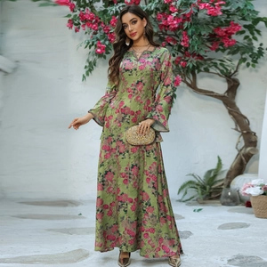 Grass green floral maxi dress with long flare sleeves and elegant V-neck design