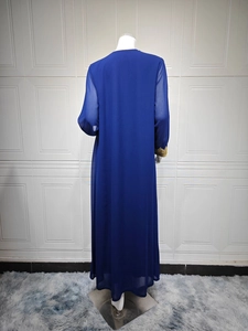 Detail of navy chiffon abaya dress with golden ethnic embroidery on sleeves