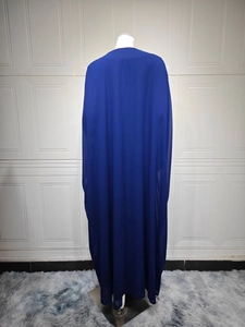 Rear view of long dark blue chiffon cape showing lightweight fabric and draped silhouette