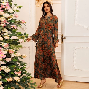 Floral print maxi dress with V-neck gold trim and long sleeves in a vintage style