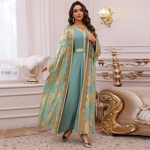 Elegant sage green two-piece kaftan dress set with ornate gold floral lace embroidery