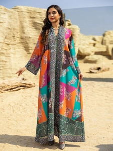 Detail of colorful geometric print abaya with floral patterns and mandala borders