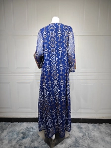 Detail view of the back and side of this navy blue embroidered mesh long dress