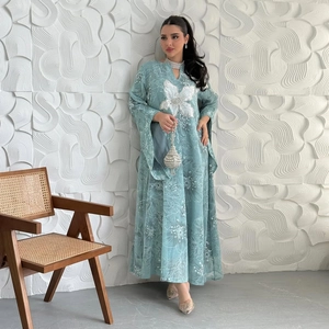 Light blue floral embroidered abaya dress with long sleeves and delicate lace appliques
