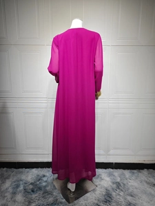 Rear view of long sleeve magenta chiffon dress featuring gold lace embroidery on cuffs