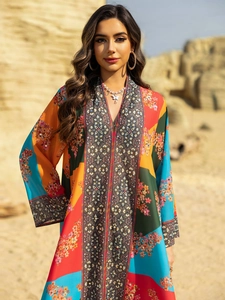Detail of bohemian floral print maxi dress with rhinestones and bold color block pattern