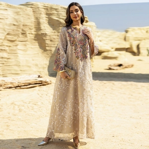 Light brown embroidered mesh maxi dress with intricate patterns for a stylish desert look