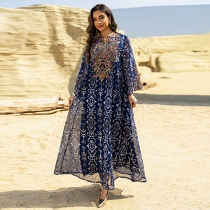 Elegant navy blue mesh maxi dress with ethnic embroidery in desert landscape