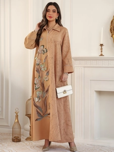 Detailed embroidery and sequins on long-sleeved jacquard maxi dress with floral patterns
