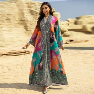 Bohemian printed long sleeve Abaya maxi dress with geometric patterns and floral border